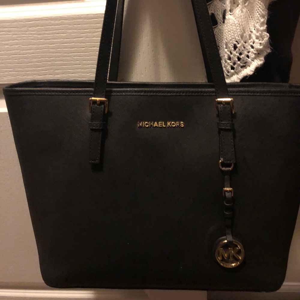 Authentic MK jet black large tote and large wallet
